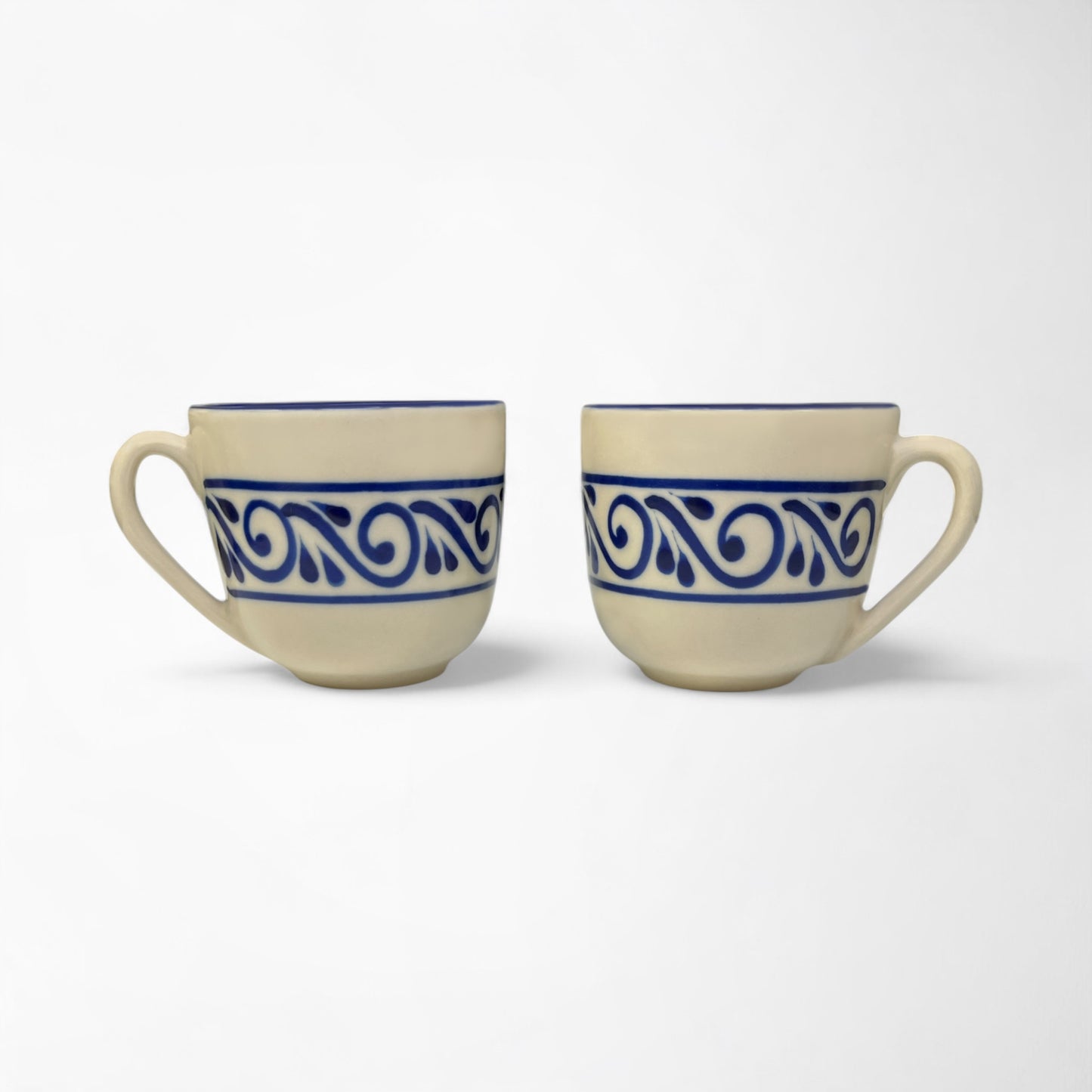 Set of ceramic mugs designed for daily coffee or tea rituals, combining comfort and beauty