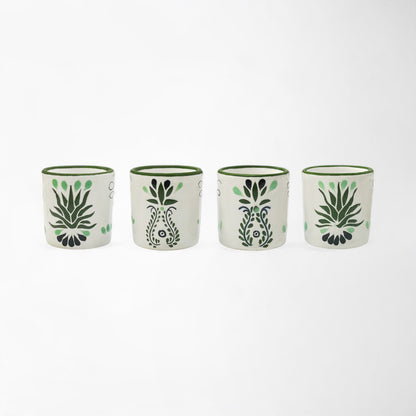 Handcrafted ceramic shot glass set of four, each with unique Talavera detail. Handmade and painted in Mexico