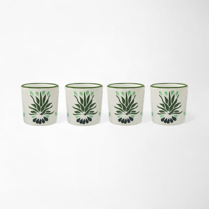 Four piece handmade mezcal shot glass set with traditional agave artwork.