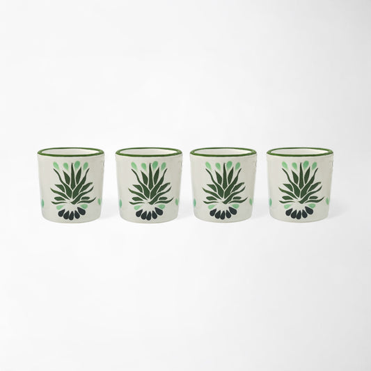 Four piece handmade mezcal shot glass set with traditional agave artwork.